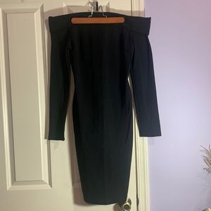 Off shoulder black formal dress.